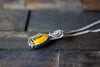 Sterling Silver Teardrop Pendant with Iridescent Yellow Fused Glass