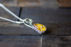 Sterling Silver Teardrop Pendant with Iridescent Yellow Fused Glass
