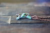 Streaks of Blue and Green Crescent Moon Pendant with Copper Wire Wrapping