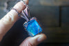 Blue and White Dichroic Fused Glass Pendant with Copper Wire Wrapping