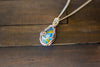 Sterling Silver Teardrop Pendant with Blue and Orange Fused Glass
