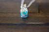 Dichroic Blue and White Crisscross Sterling Silver Wire Wrapped Pendant