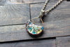 Streaked Blue and White Fused Glass and Copper Wire Pendant