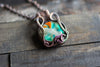 Copper Wire Wrapped Pendant with Blue-green and Orange Glass