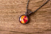 Copper Wire Wrapped Pendant with Swirled Red and Orange Glass