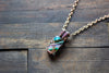 Striped Green and Blue Crisscross Copper Wire Wrapped Pendant