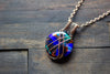 Copper Crisscross Pendant with Multi-colored Fused Glass