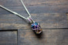 Dichroic Blue, Purple, and Gold Crisscross Sterling Silver Wire Wrapped Pendant
