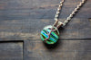 Stripes of Green and Blue Fused Glass and Copper Wire Wrapped Tree of Life Pendant
