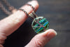 Stripes of Green and Blue Fused Glass and Copper Wire Wrapped Tree of Life Pendant