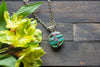 Stripes of Green and Blue Fused Glass and Copper Wire Wrapped Tree of Life Pendant
