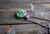 Stripes of Green and Blue Fused Glass and Copper Wire Wrapped Tree of Life Pendant