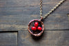Copper Bird's Nest Pendant with Red Glass Beads