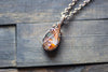 Orange and Light Blue Fused Glass and Copper Wire Teardrop Pendant