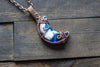 Blue and White Crescent Moon Pendant with Copper Wire Wrapping