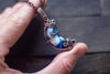 Blue and White Crescent Moon Pendant with Copper Wire Wrapping