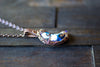 Blue and White Crescent Moon Pendant with Copper Wire Wrapping