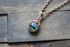 Striped Blue and Green Fused Glass Mini Pendant with Copper Wire Wrapping