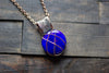 Copper Crisscross Pendant with Deep Blue Fused Glass