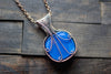 Copper Wire Wrapped Pendant with Snowflake on Streaked Blue Fused Glass