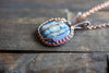 Copper Wire Wrapped Pendant with Snowflake on Streaked Blue Fused Glass