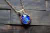 Swirls of Blue Fused Glass and Copper Wire Pendant