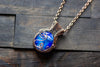 Swirls of Blue Fused Glass and Copper Wire Pendant