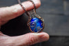 Swirls of Blue Fused Glass and Copper Wire Pendant