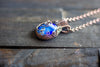 Swirls of Blue Fused Glass and Copper Wire Pendant