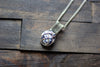 Silver, Blue, and White Crisscross Sterling Silver Wire Wrapped Pendant