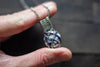 Silver, Blue, and White Crisscross Sterling Silver Wire Wrapped Pendant