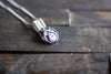 Silver, Blue, and White Crisscross Sterling Silver Wire Wrapped Pendant